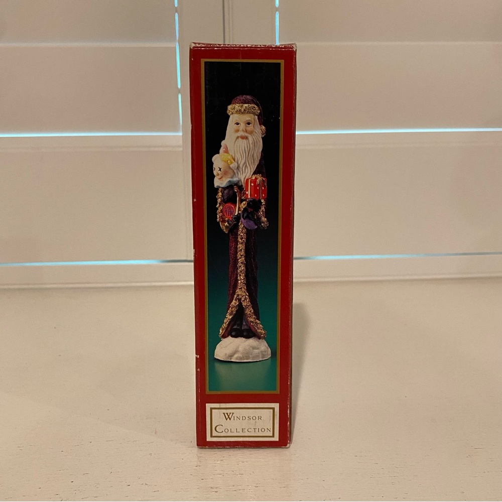 Windsor Collection Santa Holding Present and Doll Holiday Decor